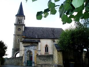 Eglise Saint Saturnin de Pouzac avec son portail Renaissance de grande qualit achev en 1563